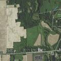 Semi truck stuck in ditch near high school