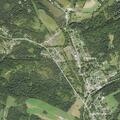 Crash damages guardrail and downs live power line