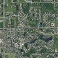 Person experiencing abdominal pain at Carmel apartment