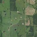 Farm equipment blocking part of highway