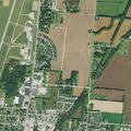 Person suffering from abdominal pain near Maple Tree Lane in Urbana