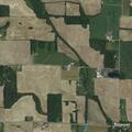 Semi truck cab fire near shop in Farmland