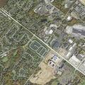 Person experiencing severe back pain at apartment