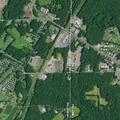 Person experiencing abdominal pain in Farmingdale