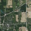 Officers check vehicle near camp on Northwood Drive