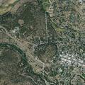 Person flees toward hill near Main Road