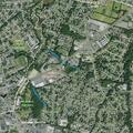 Brush fire under power lines behind property