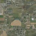 Unattended fire smoldering behind Vernal home