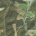 Downed power lines sparking small roadside fire