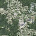 Woman experiencing abdominal and back pain in Aliquippa