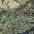 Person trapped between wall and car in garage