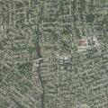 Female experiencing migraine at residential address