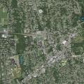 Work van hit by unknown vehicle at intersection