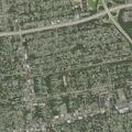 Truck reportedly dropping debris and blocking roadway