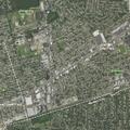 Person experiencing dizziness at Garden City Park apartment