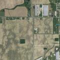 Vehicle in water with occupants on roof near county line