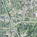 Woman experiencing back pain near 15th Street Southeast in Canton