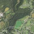 Low wire reported over creek on West Main Street