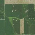 Field fire in partially harvested cornfield