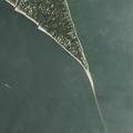 Rental boat driving unsafely near Nassau Point shore
