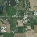 Burning debris sets trees on fire at business