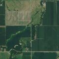 Irrigation system spraying water onto roadway