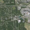 Couple arguing outside vehicles near Thruway ramp