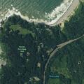 Person stranded on cliff at Agate Beach