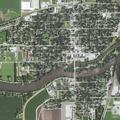 Person assisted into wheelchair near East Ohio Street