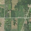 Snapped power pole with line over roadway