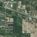 Woman with groin wound conscious at Wooster Rd lot