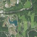 Two people in water at Oglesby river dam