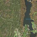 Pontoon boat stuck on Hemlock Lake near docks