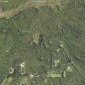 Brush fire from burn barrel threatens power lines