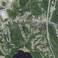 Suspicious man in black wandering neighborhood