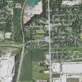 Neighbor reportedly displays shotgun through fence