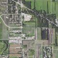 Woman reports assault by brother outside home