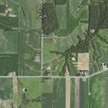 Officer checks vehicle in rural driveway