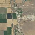 Wildland fire near homes in Honeyville area