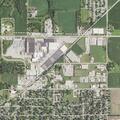 Couple arguing near concrete plant in Newton