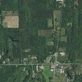 Neighbor reports concern for absent resident and tall grass