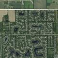 Juveniles riding motorcycle and ATV in neighborhood