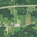 Suspicious people in dark blue car near river