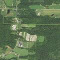 Tree and wires block State Highway 18 near school