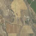 Large hay bales blocking road near Cache Junction