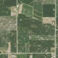 Field and building fire near 235th Street and 350th Avenue