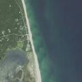 Two persons in distress on surfboards off coast