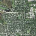 Person experiencing abdominal pain in Batavia