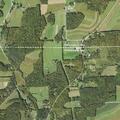 Truck slides off road on sharp curve in Middlebury