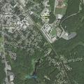 Suspicious gray minivan left running behind home